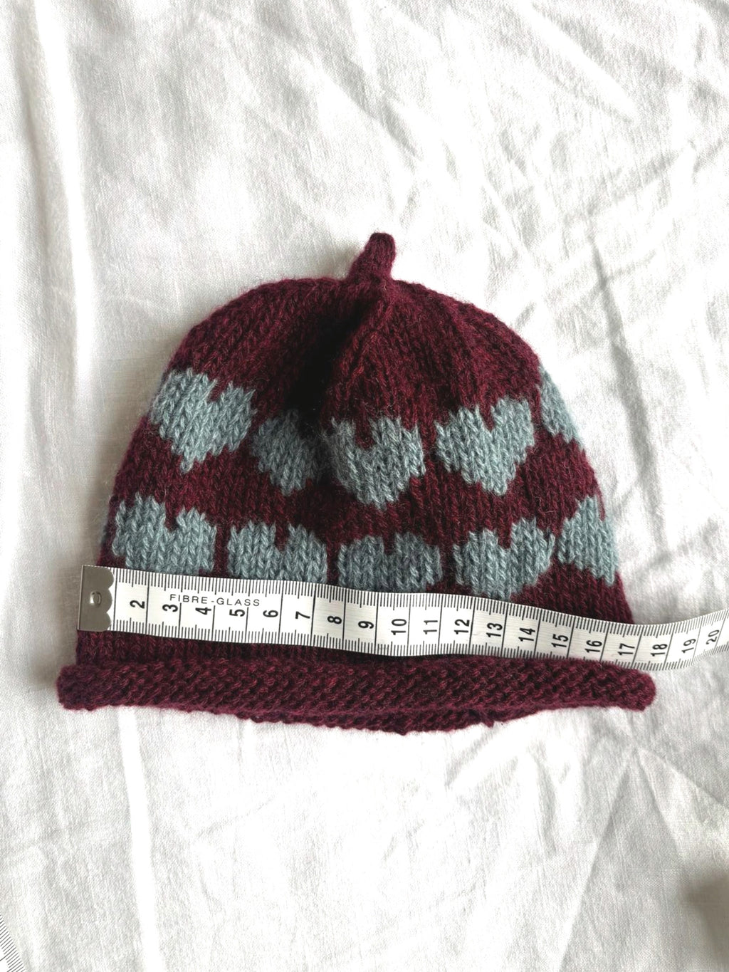 Älskling in burgundy and duck-egg blue, hand-knitted cashmere baby hat