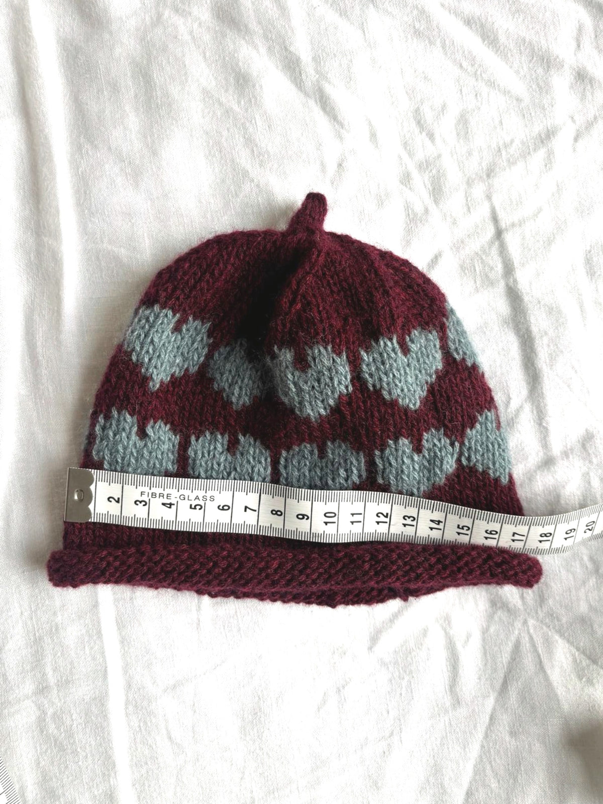 Älskling in burgundy and duck-egg blue, hand-knitted cashmere baby hat