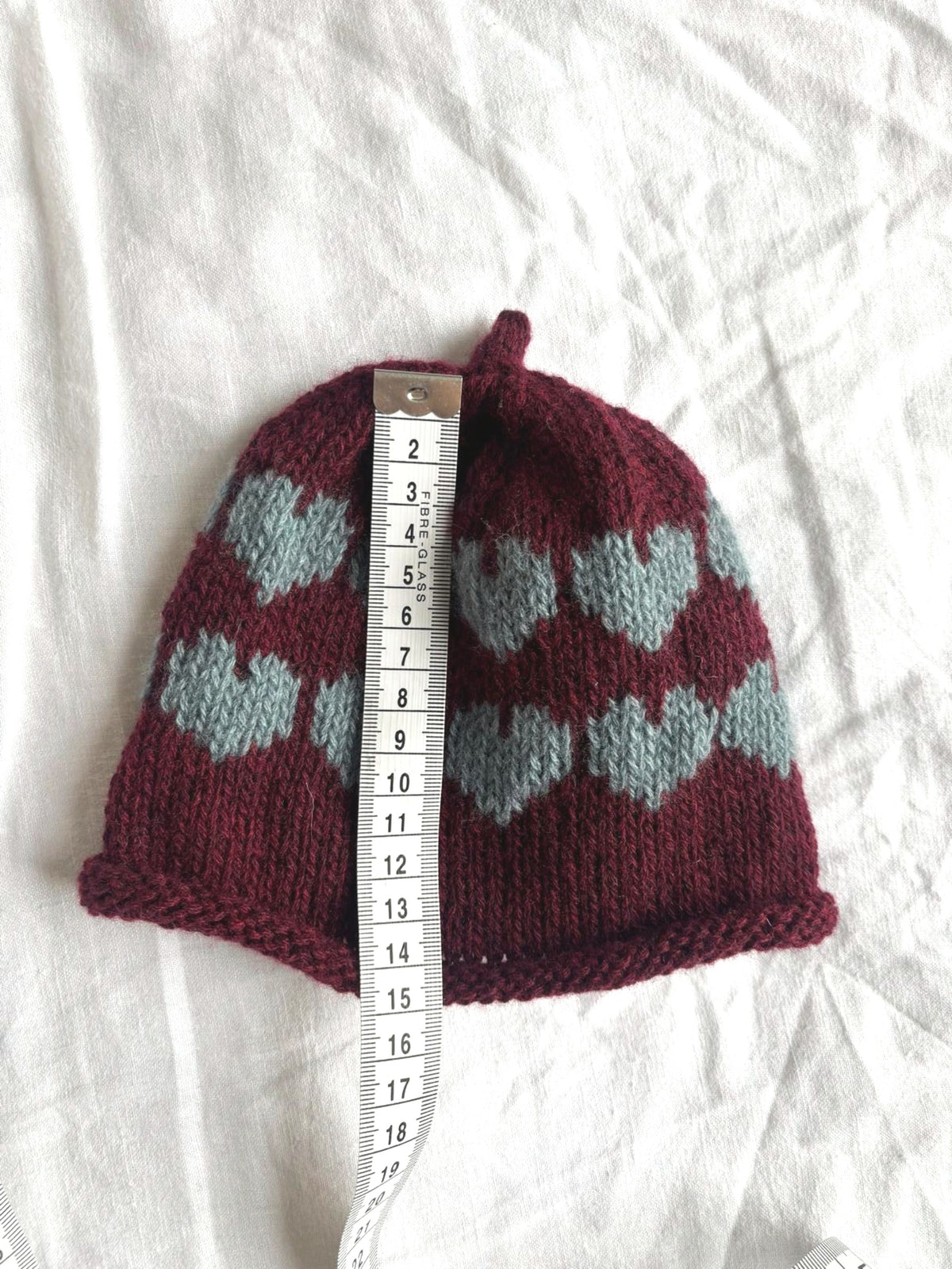 Älskling in burgundy and duck-egg blue, hand-knitted cashmere baby hat