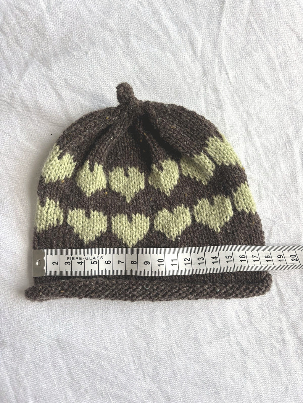Älskling in brown and pistachio, hand-knitted cashmere baby hat