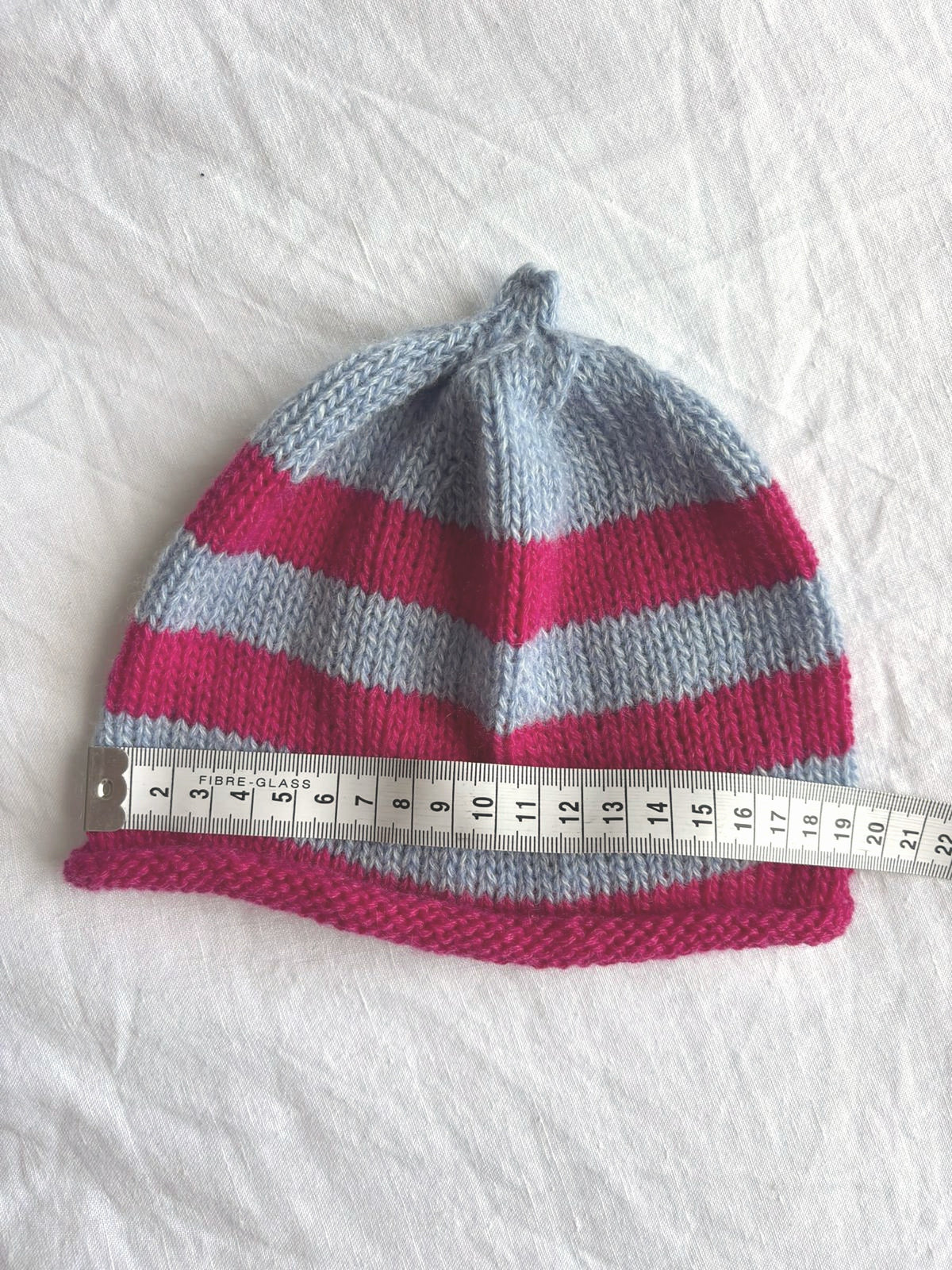 Godis in baby blue and pink, hand-knitted cashmere baby hat