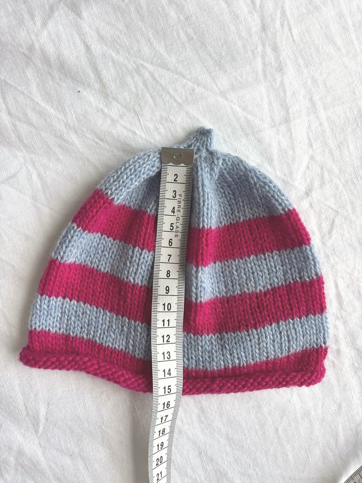 Godis in baby blue and pink, hand-knitted cashmere baby hat