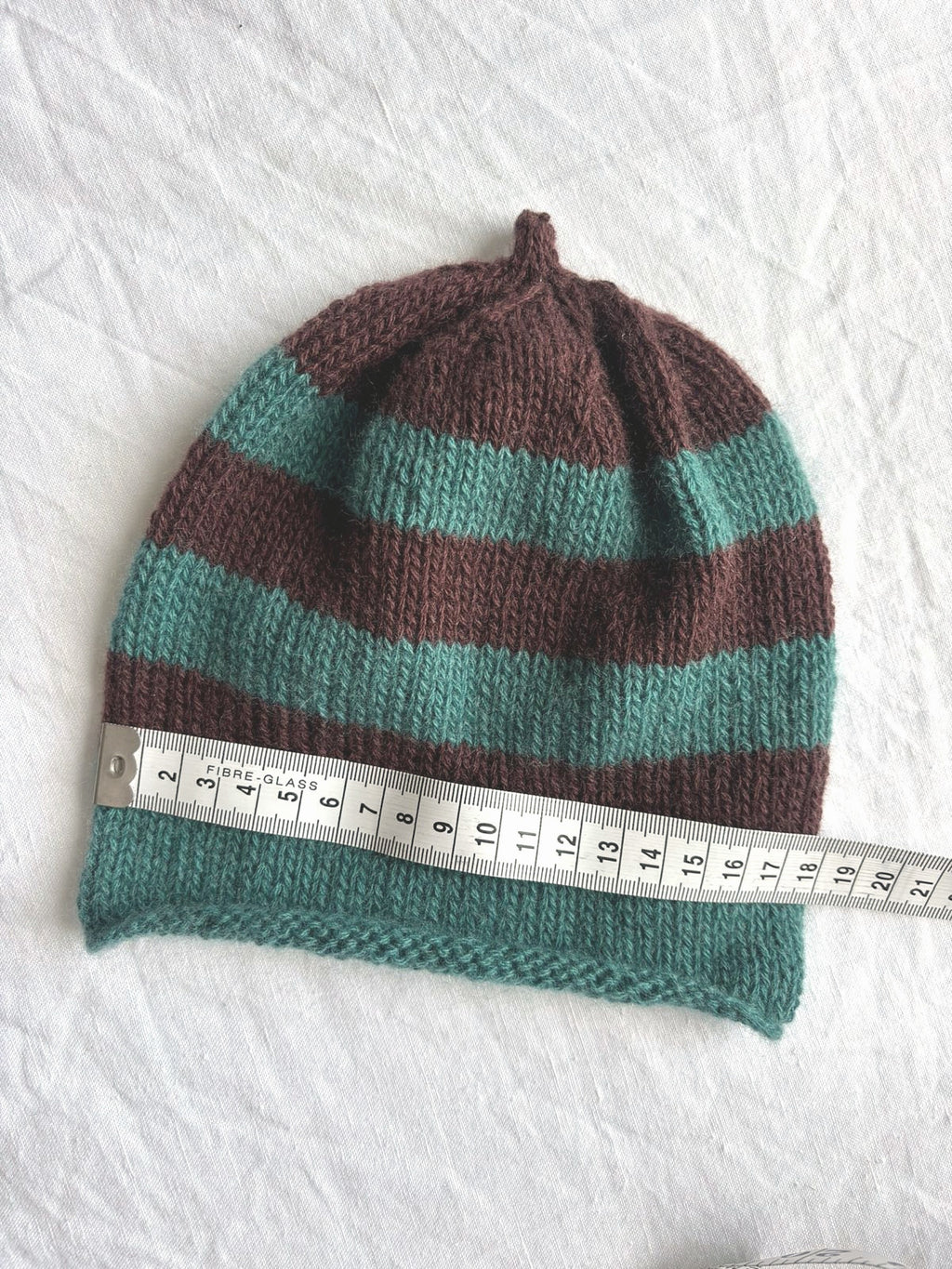 Godis in brown and turquoise, hand-knitted cashmere baby hat