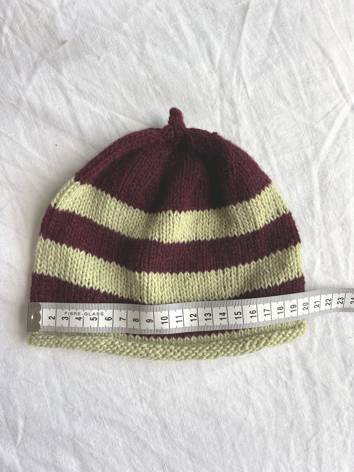 Godis in burgundy and lime, hand-knitted cashmere baby hat
