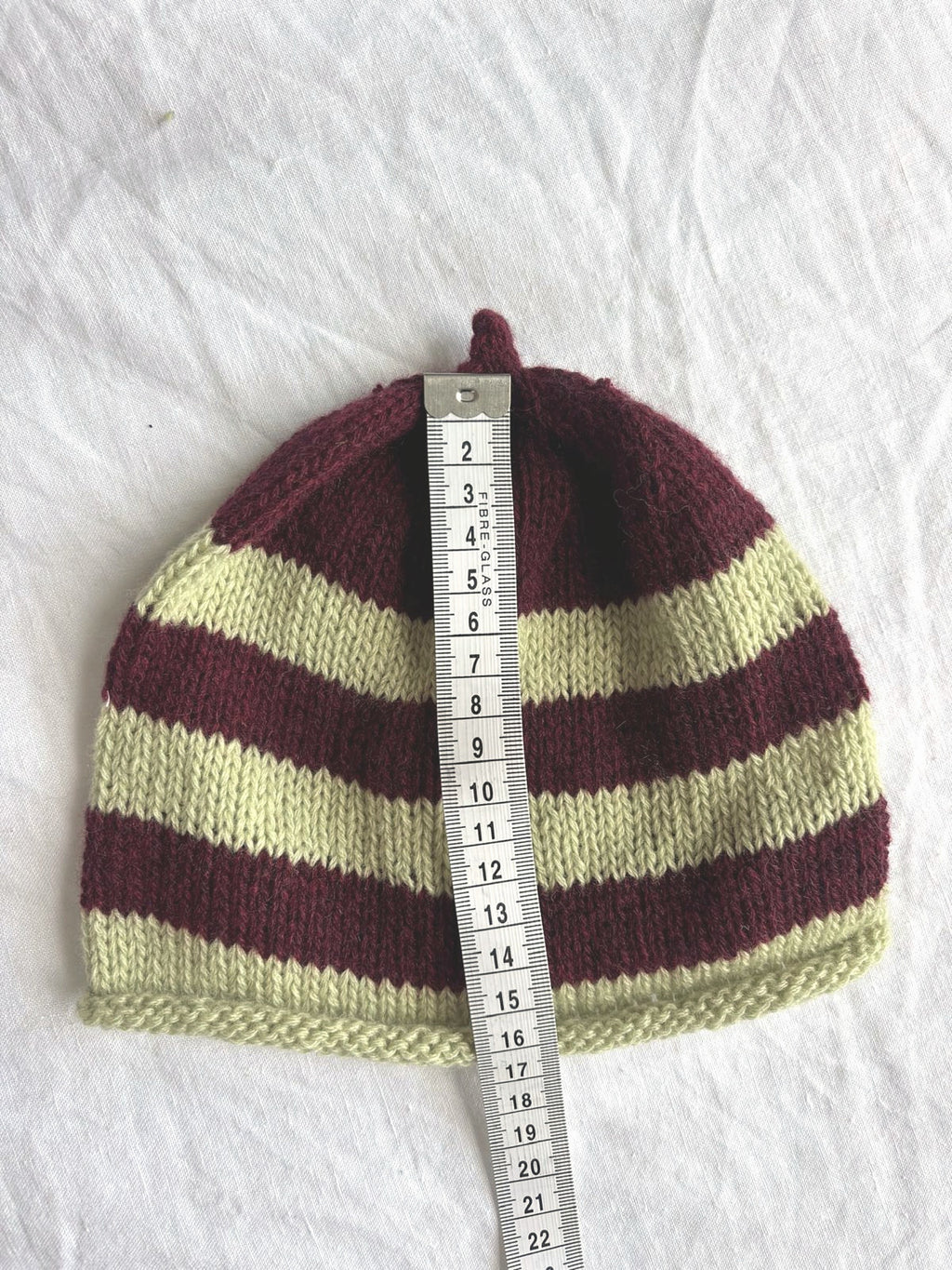 Godis in burgundy and lime, hand-knitted cashmere baby hat