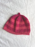 Godis in raspberry and coral, hand-knitted cashmere baby hat
