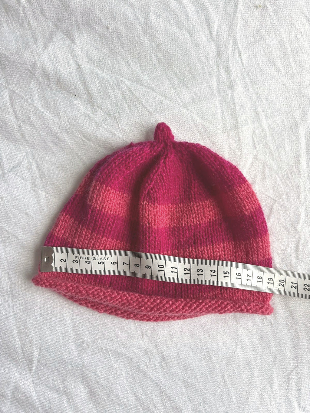 Godis in raspberry and coral, hand-knitted cashmere baby hat