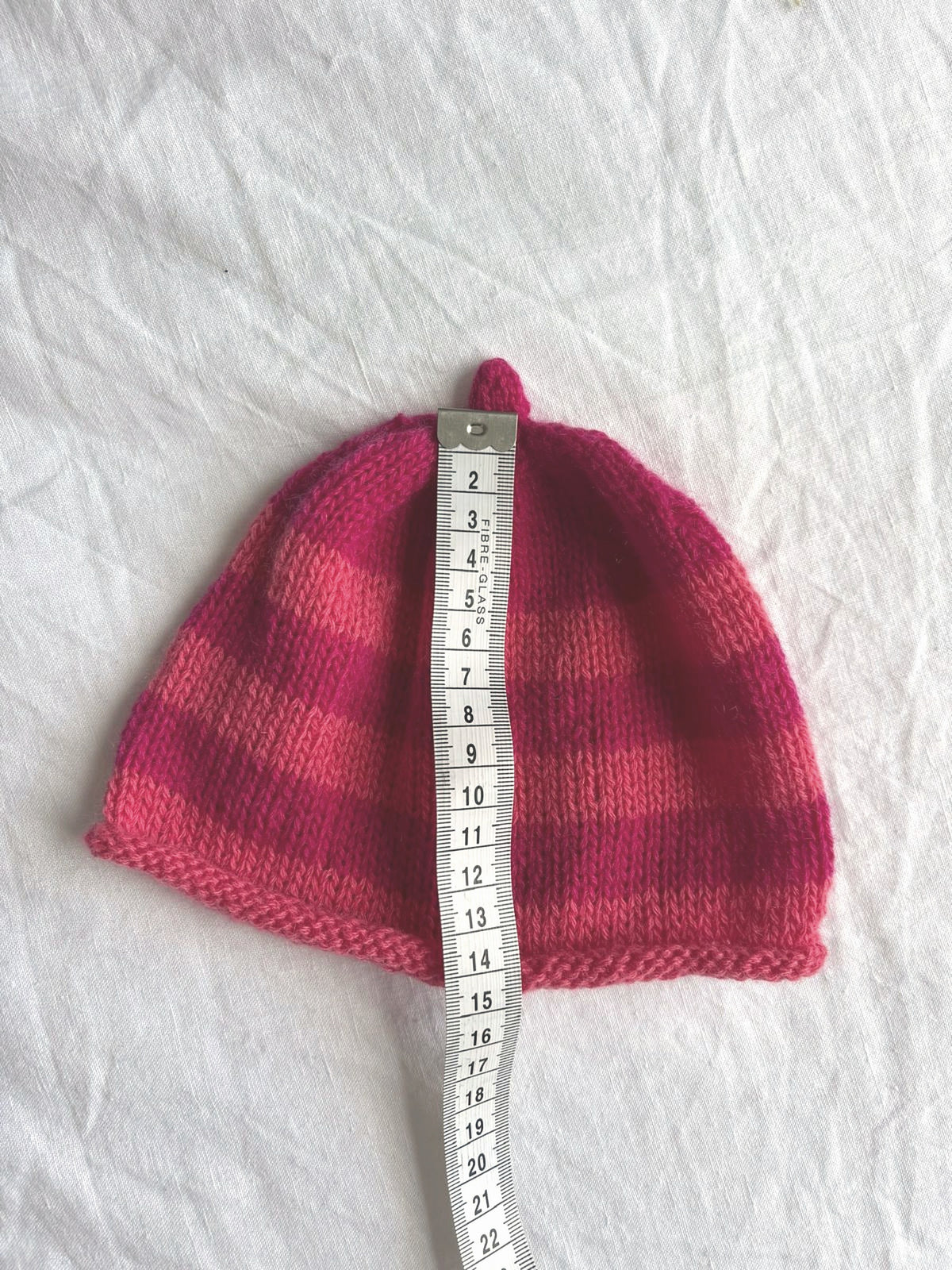 Godis in raspberry and coral, hand-knitted cashmere baby hat