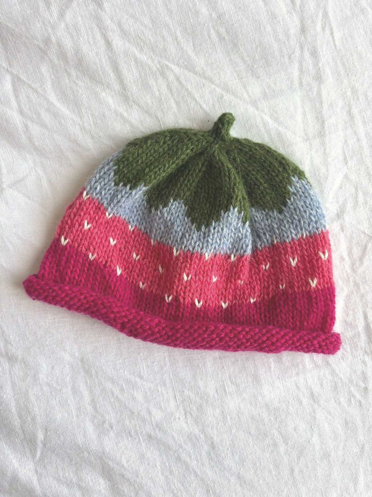 Smultron in pink and baby blue, hand-knitted cashmere baby hat